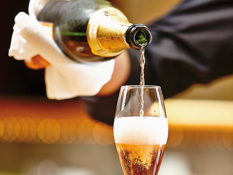 Sparkling wine being poured into a glass